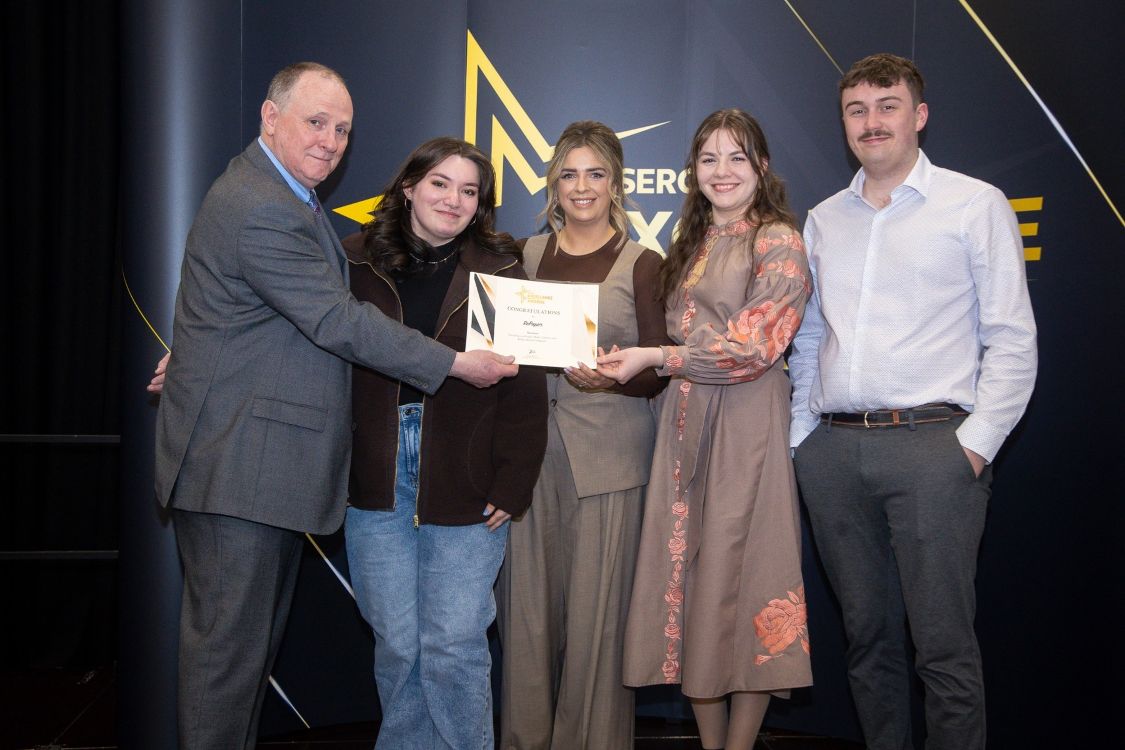 Students being presented with an Award